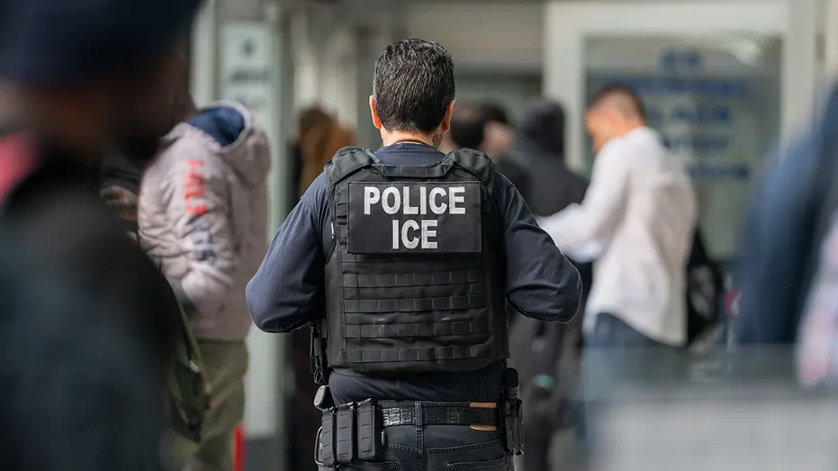 ice-officer-back